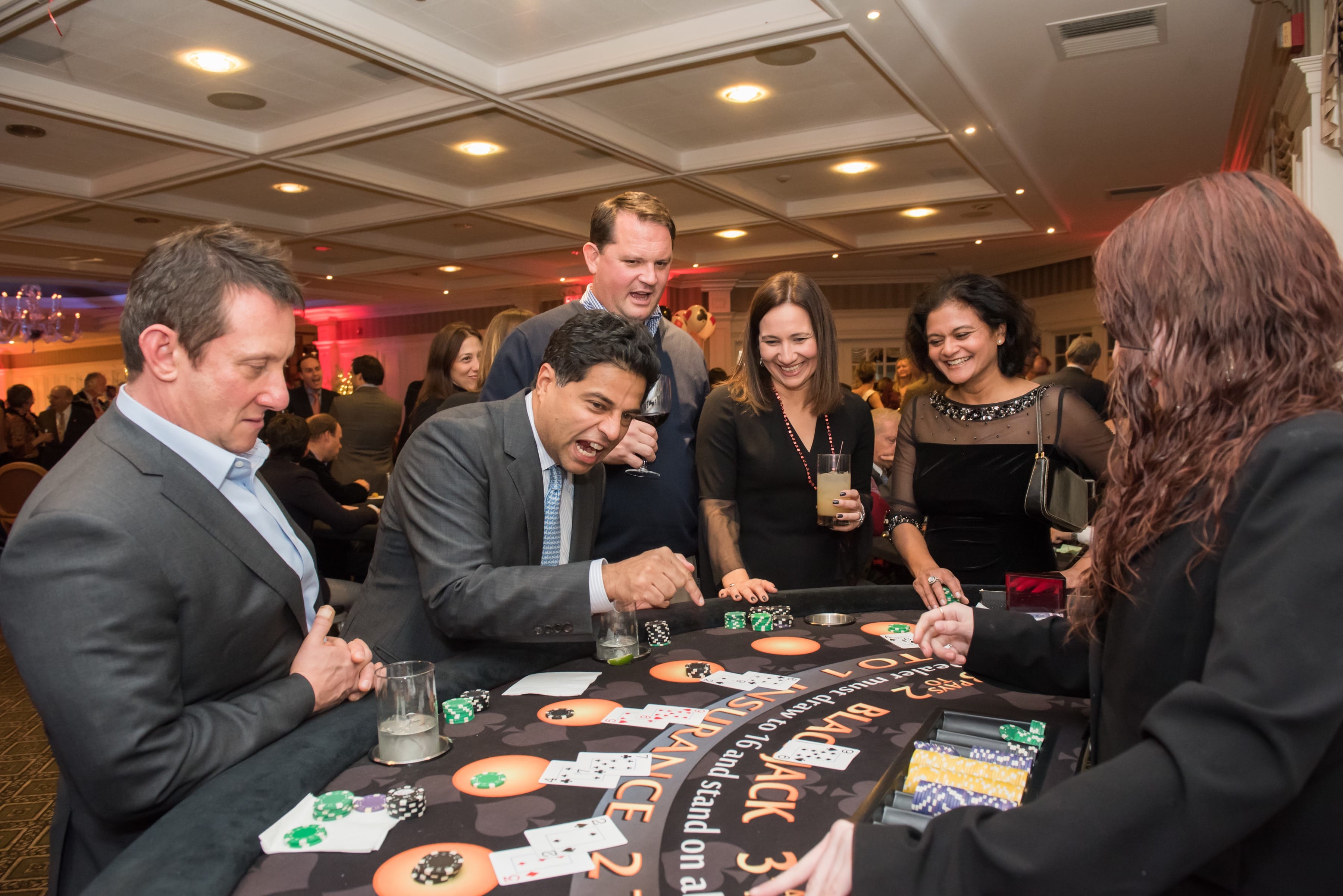 Casino Night 2019 guests playing cards