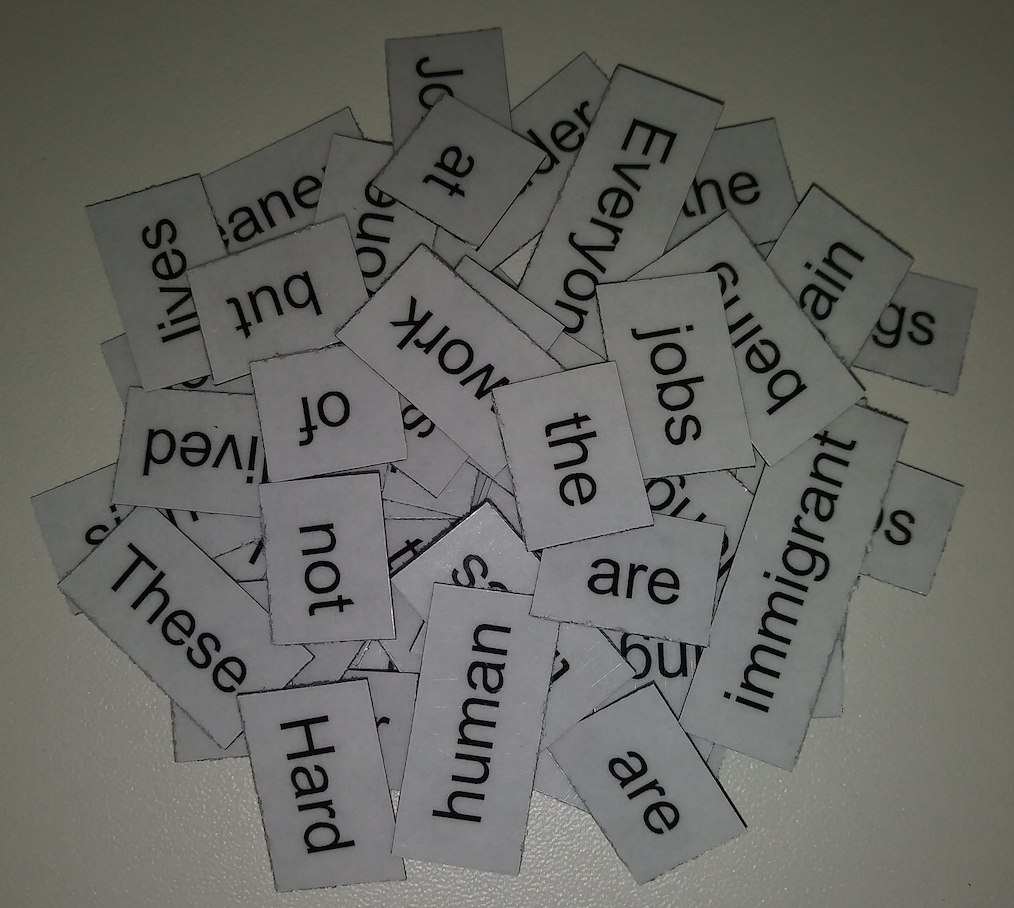 Pile of magnets, each one with a word printed on it