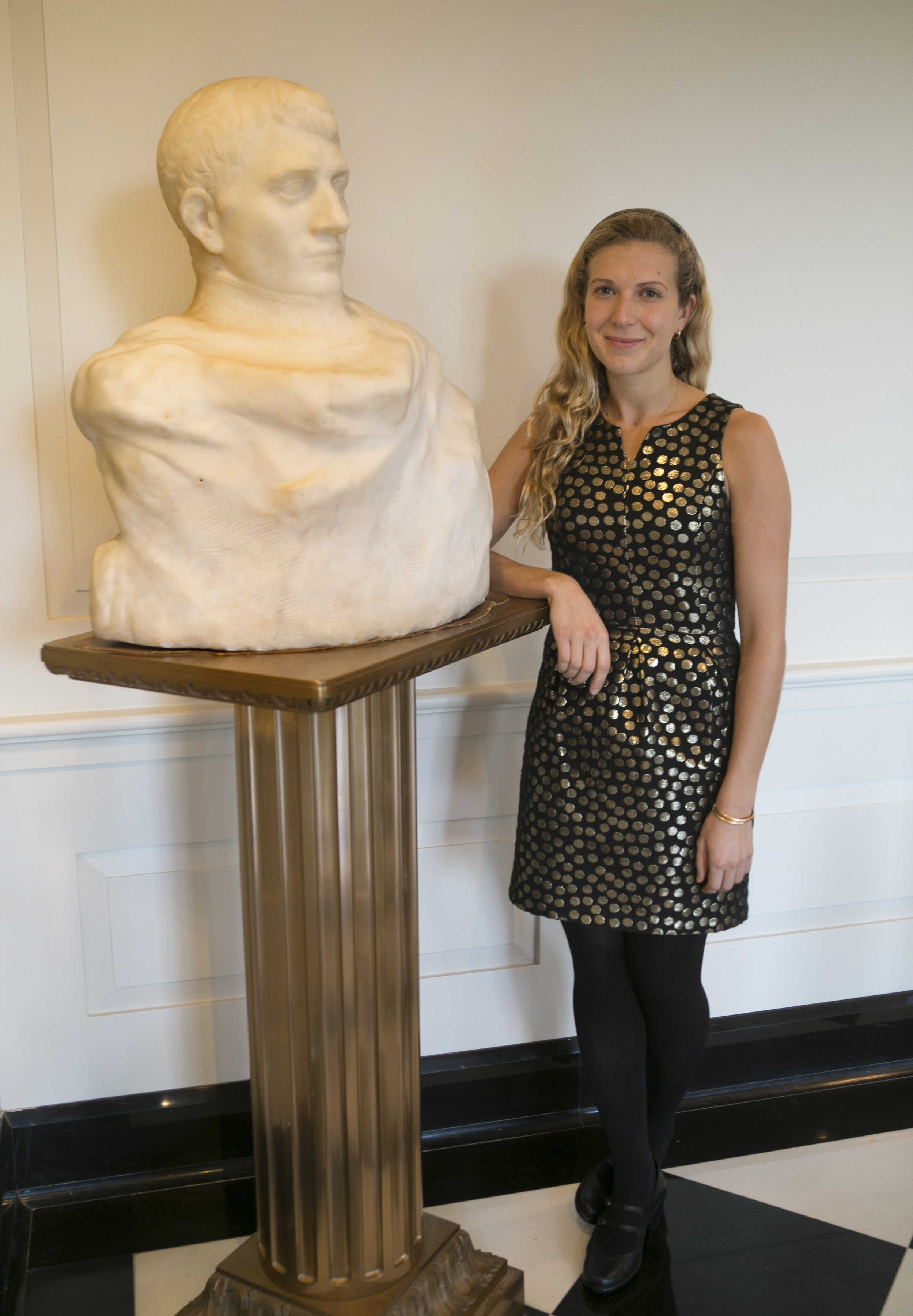 Mallory Morrtillaro with Rodin's sculpture of Napoleon