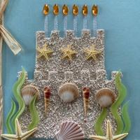 Birthday cake craft made with shells and jewels