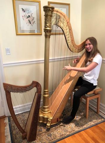 Eva Playing the Harp